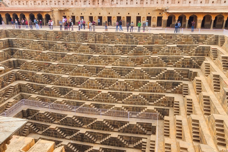 Tourist are watching Chand Baori with our Guide.